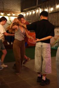 a group of people standing next to each other at Maka Hostel in Oaxaca City +16 photos
