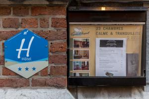 Certifikát, hodnocení, plakát nebo jiný dokument vystavený v ubytování Hotel Le Cygne d'Argent