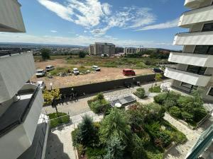 an aerial view of a parking lot in a building at Fancy Bonjour - modern apartment in Iaşi +9 photos