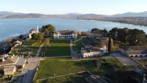 an aerial view of a castle and a lake at THOMAS LUXURY MAISONETTE in the Historical Center of Ioannina in Ioannina