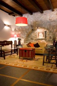 Posezení v ubytování Hotel Caldas