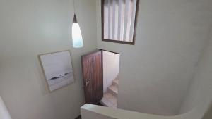a bathroom with a sink and a mirror at Beach Bliss Retreat in Margate +24 photos