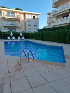 a swimming pool in the middle of a building at Cannes Park in Cannes
