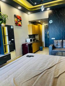 a bedroom with a large bed in a room at Unique property in Ghaziabad