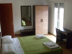 Postel nebo postele na pokoji v ubytování Euro Inn B&B