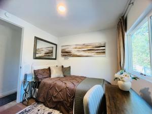 a bedroom with a bed and a window at Dafna, Unit 3 - Two Bedroom, One Bath in Cromberg +26 photos