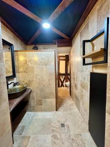 a bathroom with a sink and a mirror at Le 16 authentique au cœur de la ville in Lisieux +27 photos