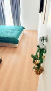 a room with a door with a door knob and a door at TRIO Sun Class Park Residence in Târgovişte