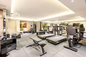 a gym with several treadmills and machines in it at Luxurious Villa Private Pool Private Beach Views in Bodrum City