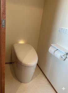 a bathroom with a toilet with two rolls of toilet paper at BLANKS - Vacation STAY 37519v in Taisha