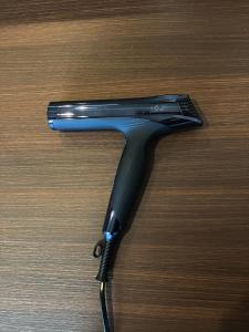 a black hair dryer sitting on top of a table at BLANKS - Vacation STAY 37519v in Taisha
