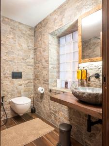 a bathroom with a sink and a mirror at Cjase san Pieri in Cividale del Friuli +33 photos