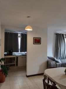 a living room with a couch and a table at Jujuy Centro 2 in San Salvador de Jujuy