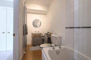 a bathroom with a toilet and a sink at Drumnacree House, Alyth in Alyth +39 photos