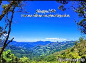 a view of the mountains from a mountain top at Studio Mara Alagoa in Alagoa