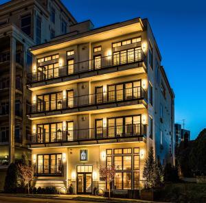 a large building with lights on the side of it at The 121 Hotel in Nashville