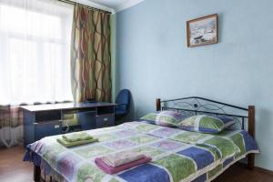 Uma cama ou camas num quarto em Apartment on Khreschatyk 21