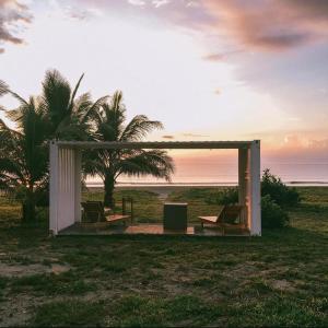 a gazebo on the beach with a view of the ocean at Cote Resort in Dipaculao +11 photos