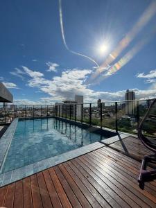 a swimming pool on the roof of a building at Flat Exclusivo com Rooftop e Piscina in Campina Grande