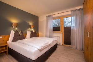 Postel nebo postele na pokoji v ubytování Appartement Nanske