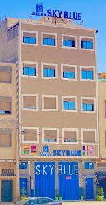 a building with a sky blue sign on it at Dakhla sky blue in Dakhla