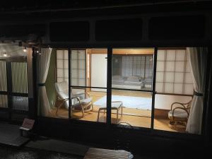 a room with a view of a living room at Ohana in Kuroshio