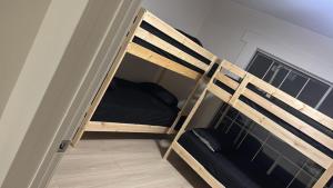 a couple of bunk beds in a room at KTown Sanctuary Soul in Los Angeles