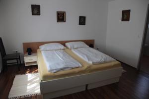 Postel nebo postele na pokoji v ubytování Pension Casa Topolino