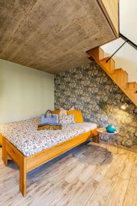 a bedroom with a large bed in a room at Penzion U Kapličky in Znojmo