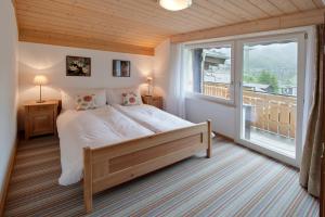 Postel nebo postele na pokoji v ubytování Apartments Styria
