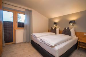 Postel nebo postele na pokoji v ubytování Appartement Nanske