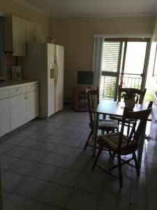 Kuchyň nebo kuchyňský kout v ubytování Americana Luxury Apartments