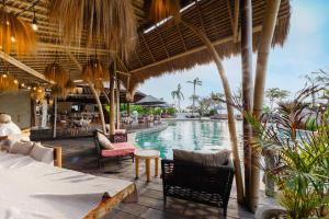 a resort with a swimming pool and a restaurant at La Joya Balangan Resort in Jimbaran +48 photos