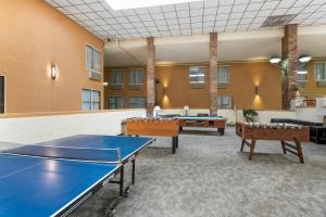 a ping pong room with two ping pong tables at Quality Inn Alamosa in Alamosa