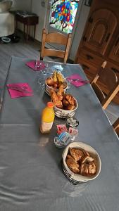 a table with plates of food on top of it at Chez Laurence in Locronan