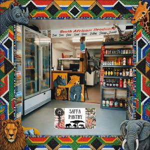 a store with a safari pantry with a lion and other items at 1770 Holiday Village in Seventeen Seventy