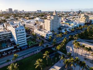 an aerial view of a city with palm trees and buildings at Hotel Casa Canita in Miami Beach