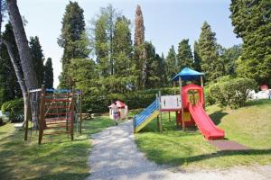 a group of playground equipment in a park at Inaya Apartment in Oggebio