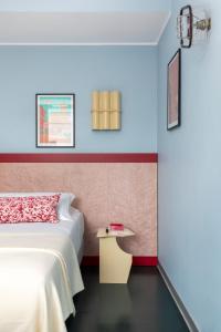 Lova arba lovos apgyvendinimo įstaigoje Moderno Hotel Roma - Adults Only