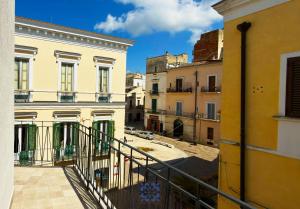 a view from the balcony of a building at Passo Lento Charme Rooms in Gravina in Puglia