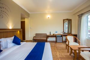 Postel nebo postele na pokoji v ubytování Hotel White Pearl
