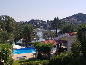a view of a resort with a swimming pool at The Garden Maisonette in Gouvia
