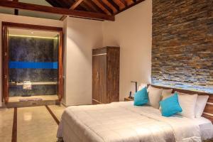 Ένα ή περισσότερα κρεβάτια σε δωμάτιο στο R Degrees Boutique Hotel & Spa
