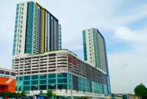 two tall buildings in a city with at Kita Retail Management Sdn Bhd in Bandar Baru Bangi