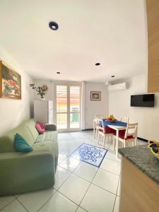 a living room with a couch and a table at FRANCESCA'S HOUSE in Minori