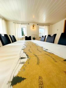 a table in a room with a map on it at Ferienhaus am Erzgebirgskamm in Marienberg