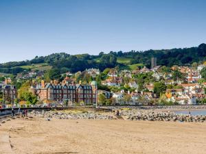 a view of a beach with a town in the background at 2 Bed in Taunton oc-41906 in Cothelstone