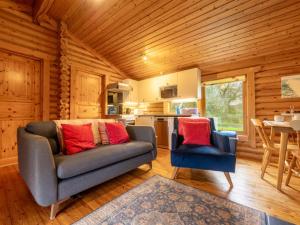 a living room with a couch and two chairs at 2 Bed in Bideford oc-00370 in Clovelly