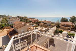 a view from the balcony of a house near the ocean at Hotel Sant Jordi in Tarragona +28 photos