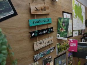 a wall with signs on it with books at ibis Chateauroux in Châteauroux